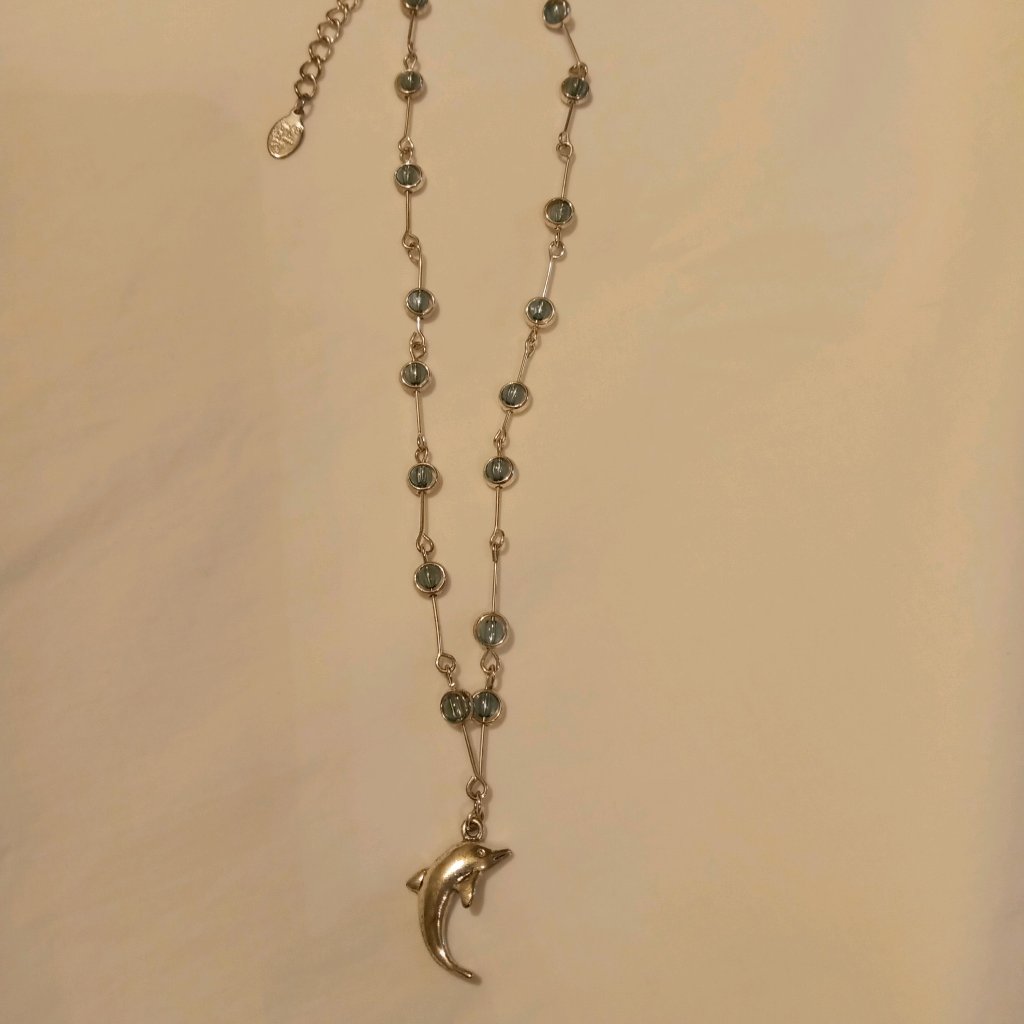 Cool Jewels - Dolphin Charm Necklace With Light Blue Stones.